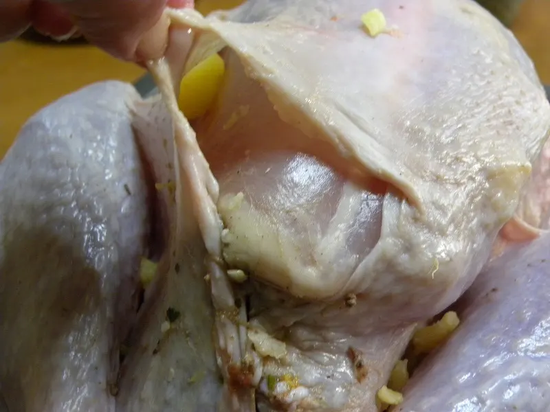 Adding butter under the skin image