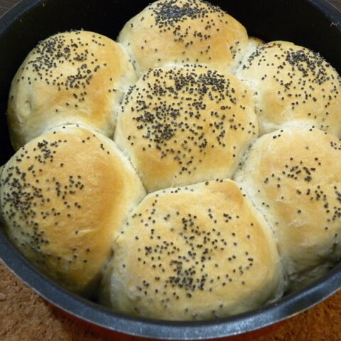 Pull-aparts with feta graviera and tyrokafteri pepper and a little milk image
