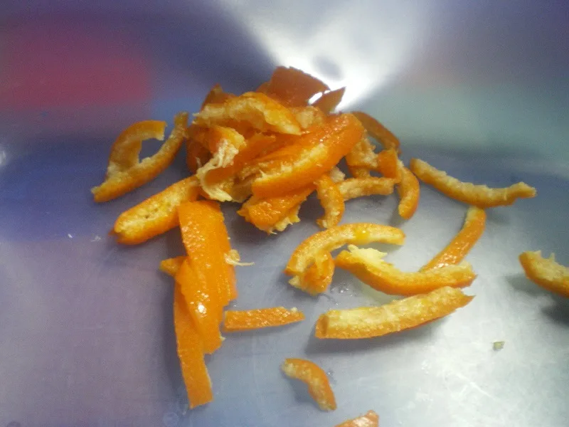 Cutting the citrus fruit in stripes image