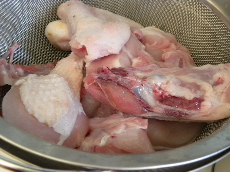 chicken cut into smaller pieces image