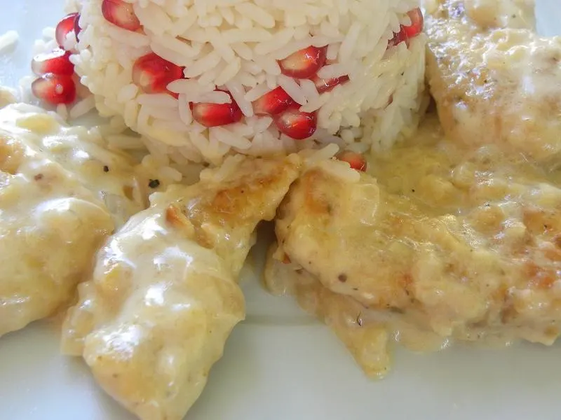 Chicken Fricasse Rice with pomegranate Chicken Fricassee with pomegranate Rice image