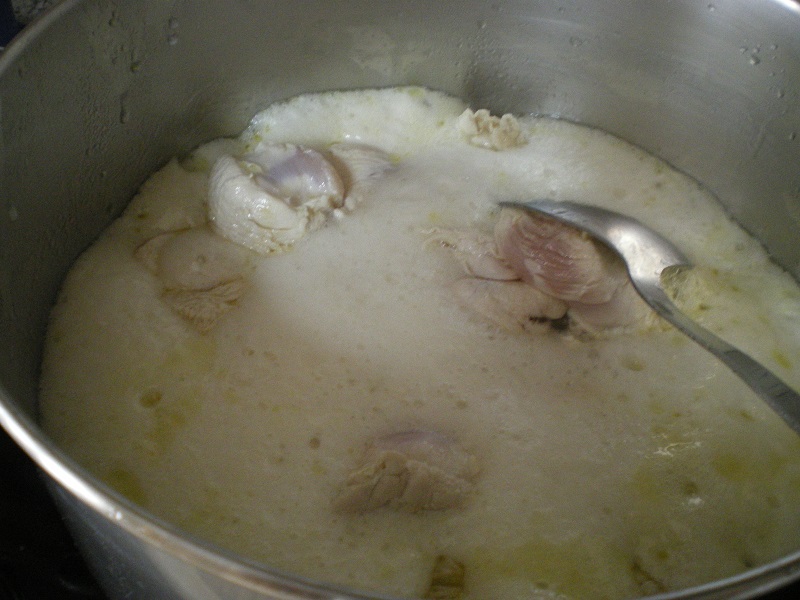 Adding beer to the turkey image