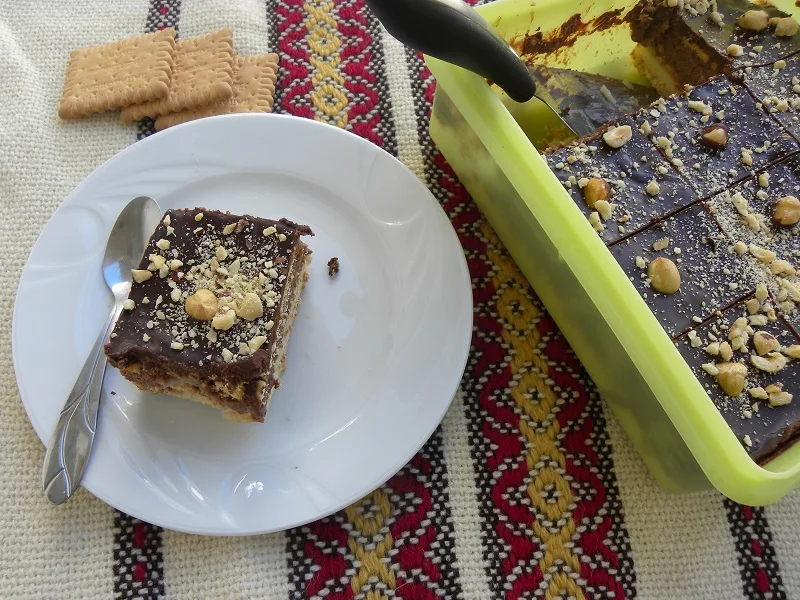 Dessert in a plate with dessert in a bowl and some Petit Beurre biscuits image