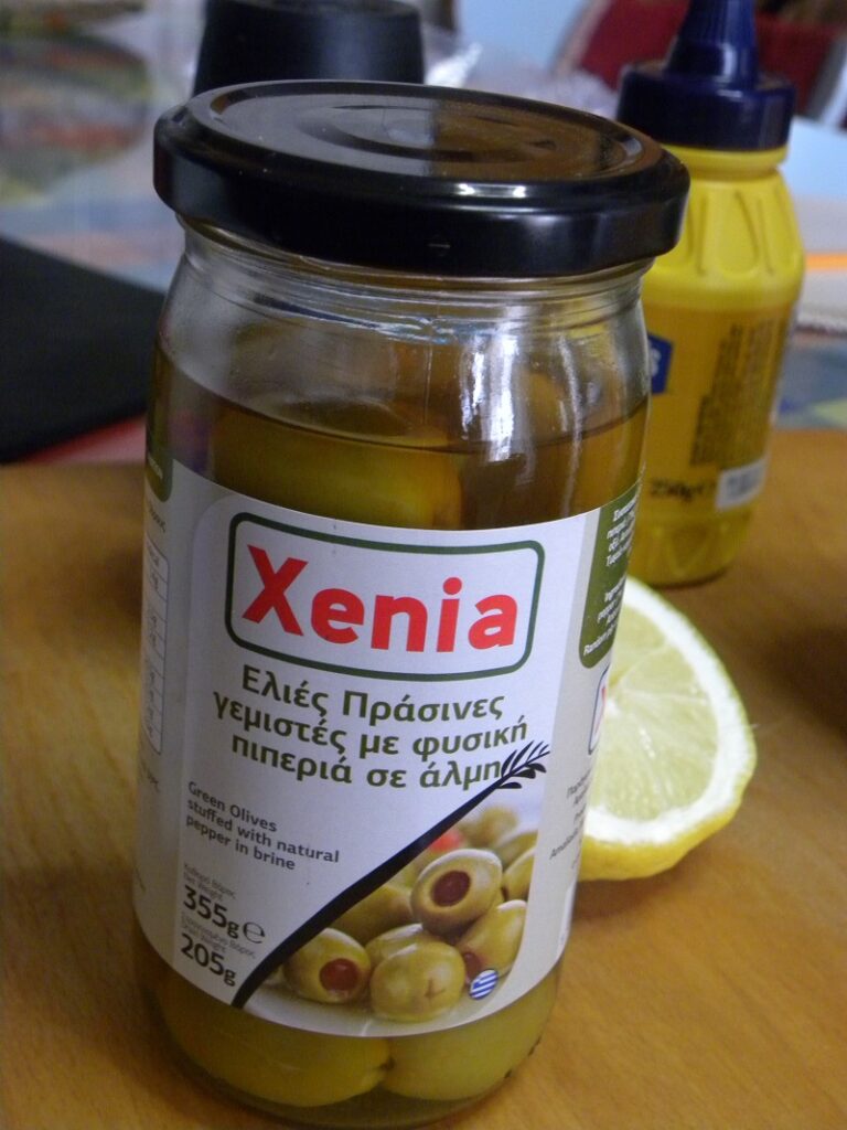 Green stuffed olives image
