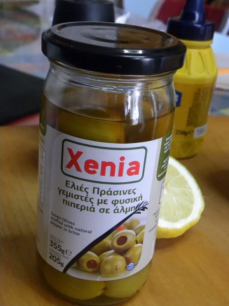 Green stuffed olives image