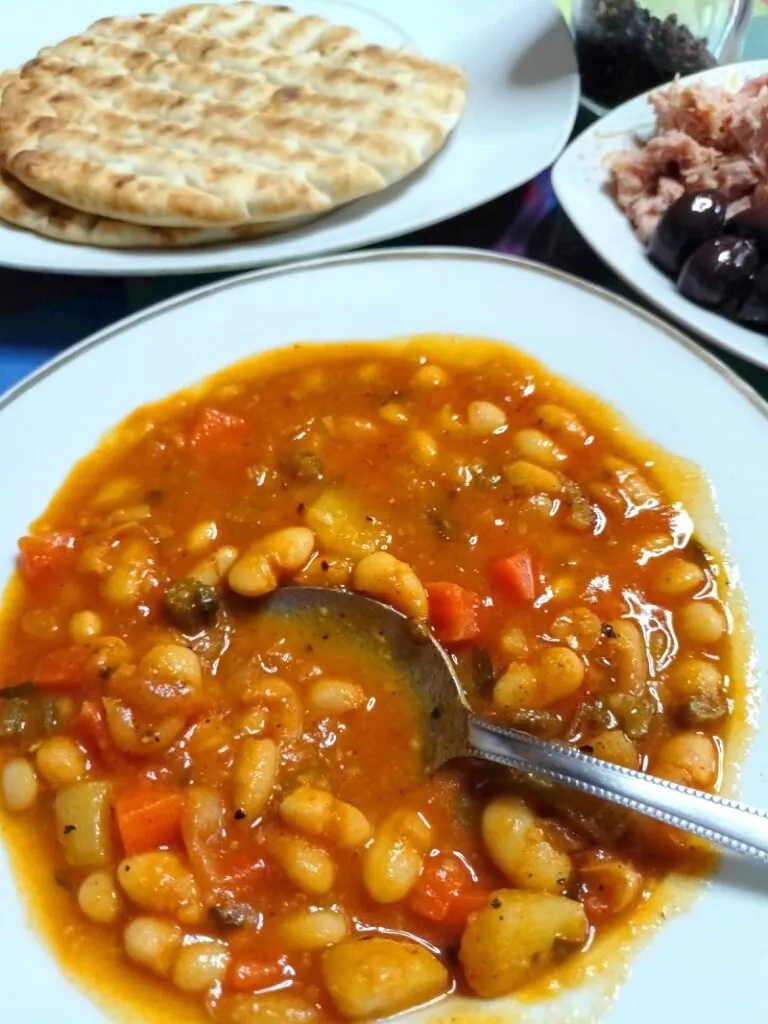 Fassolada with pita bread, tuna and Kalamata olives image