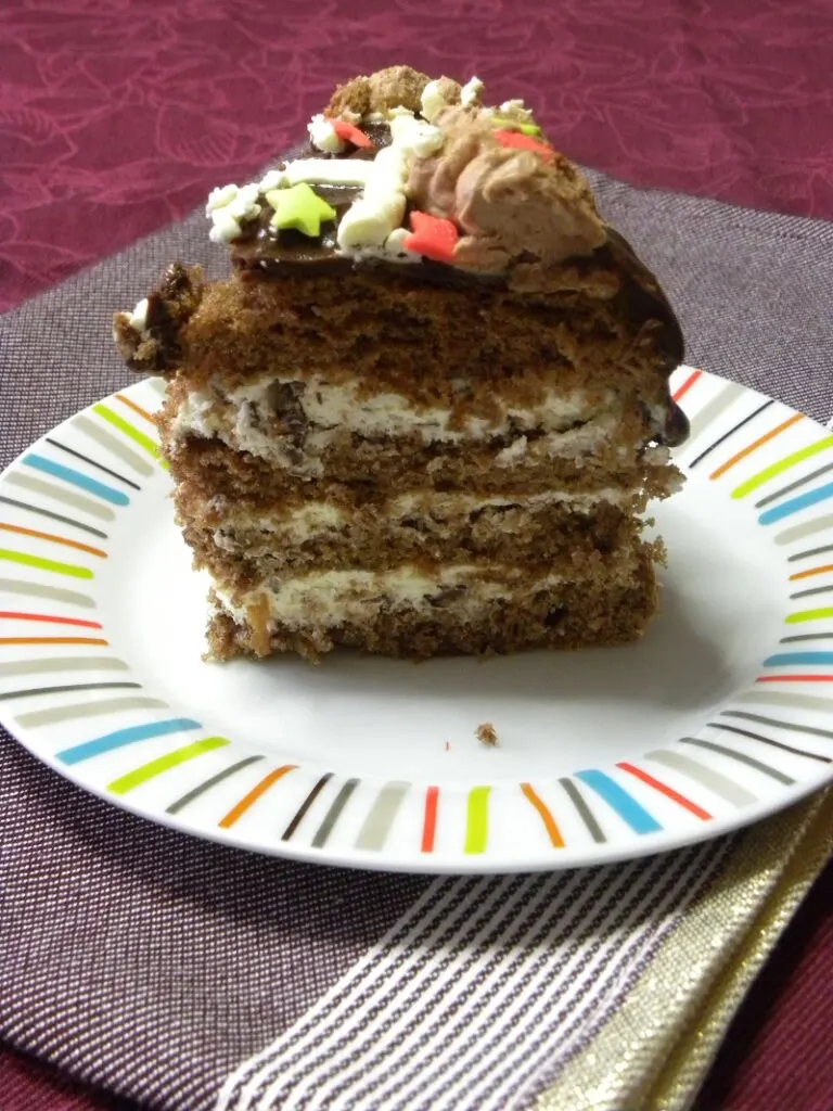 Piece of stracciatella mocha cake cut image