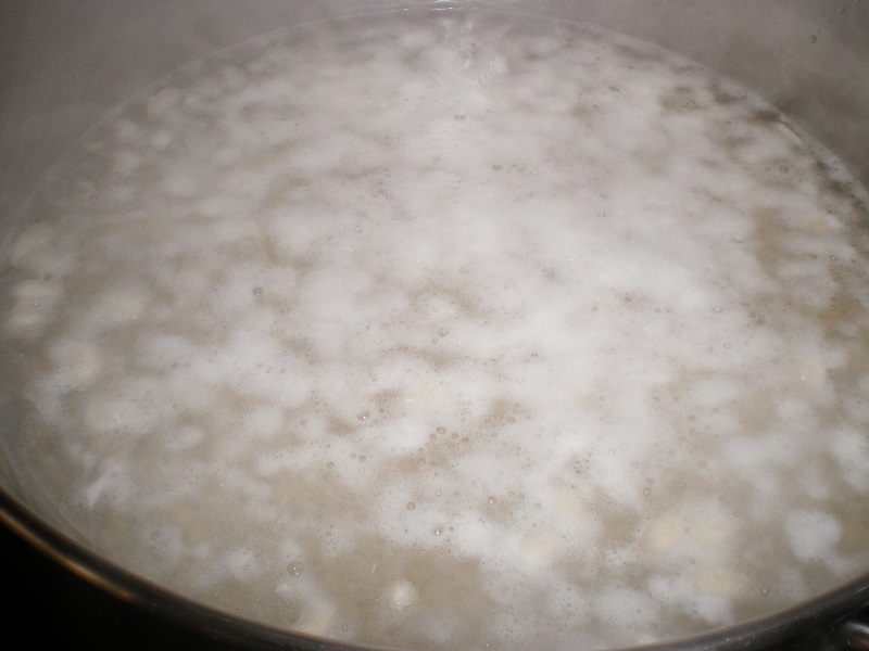 Skimming froth from the beans image