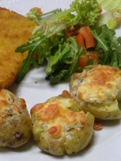Smashed potatoes with schnitzel image