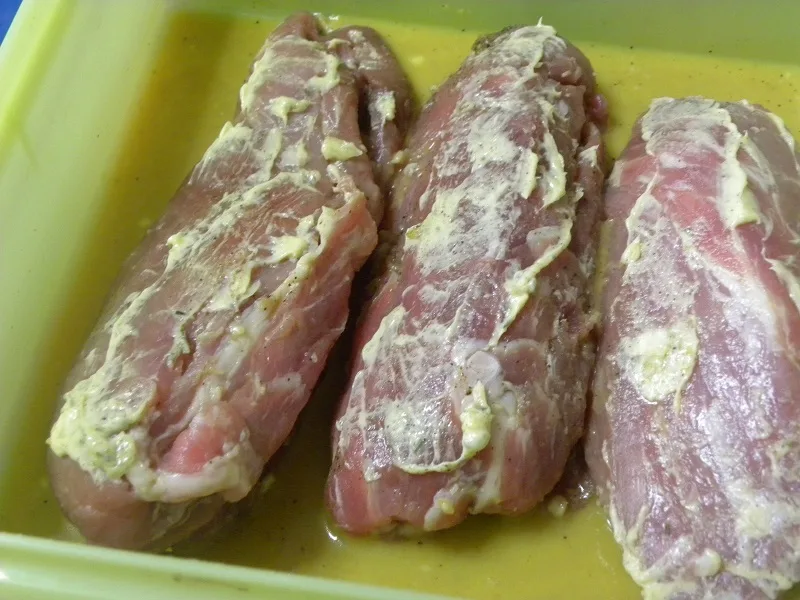 Marinating the port tenderloins image