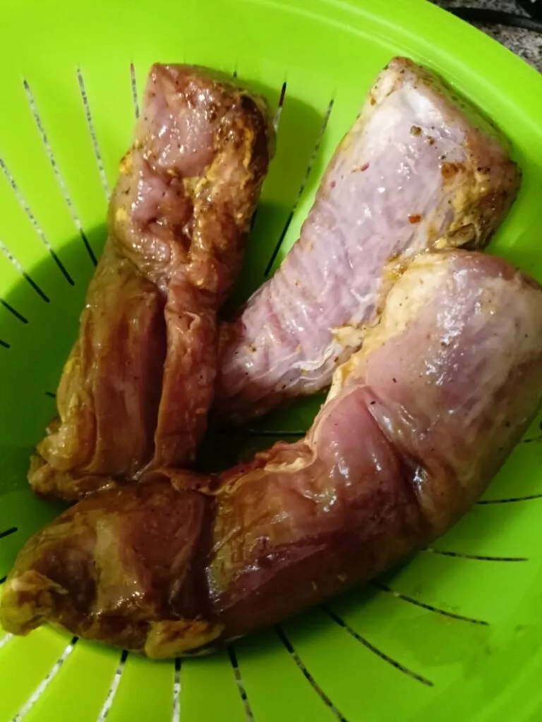 draining pork tenderloin image
