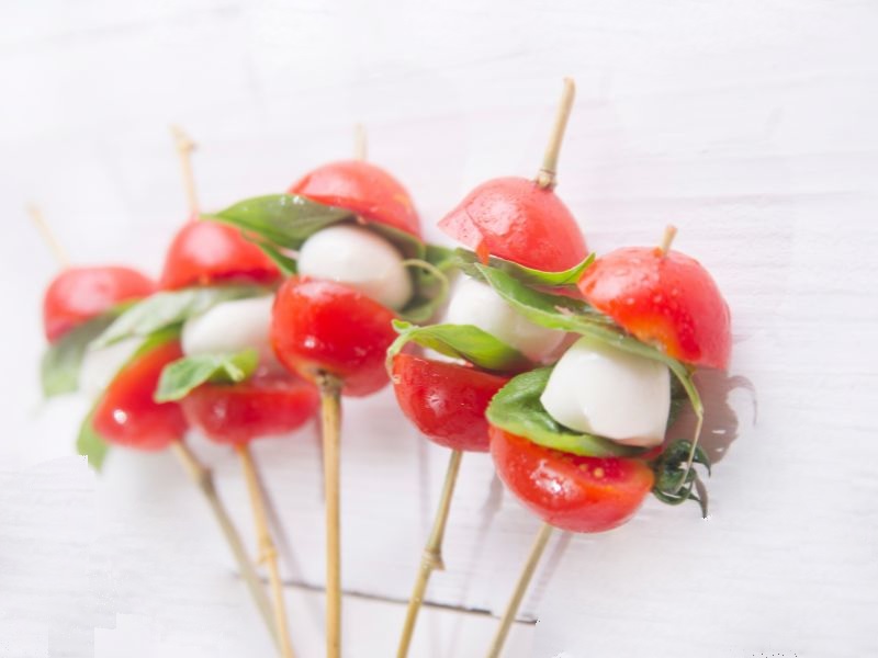 Mini caprese skewers on toothpicks image