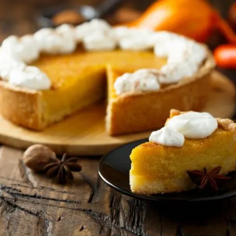 Pumpkin pie with whipped cream image