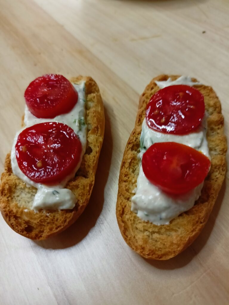 Salmon and cream cheese spread on top of Krispies image