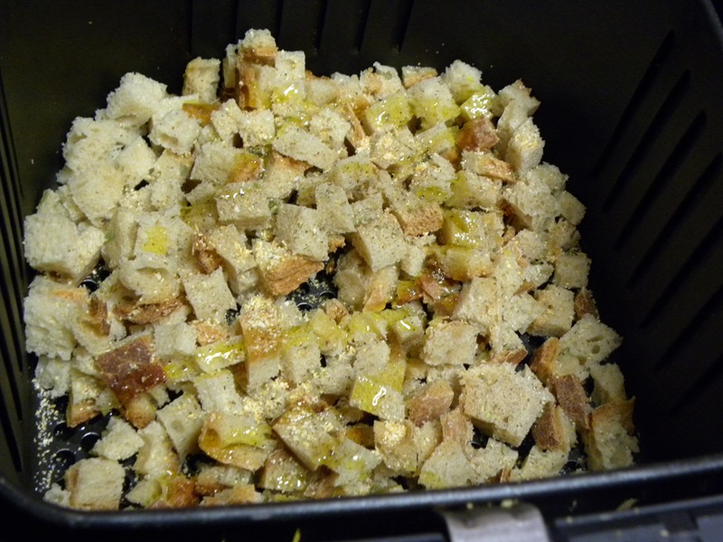 Croutons in the air fryer before baking image