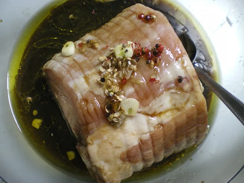 Marinating the pork loin image