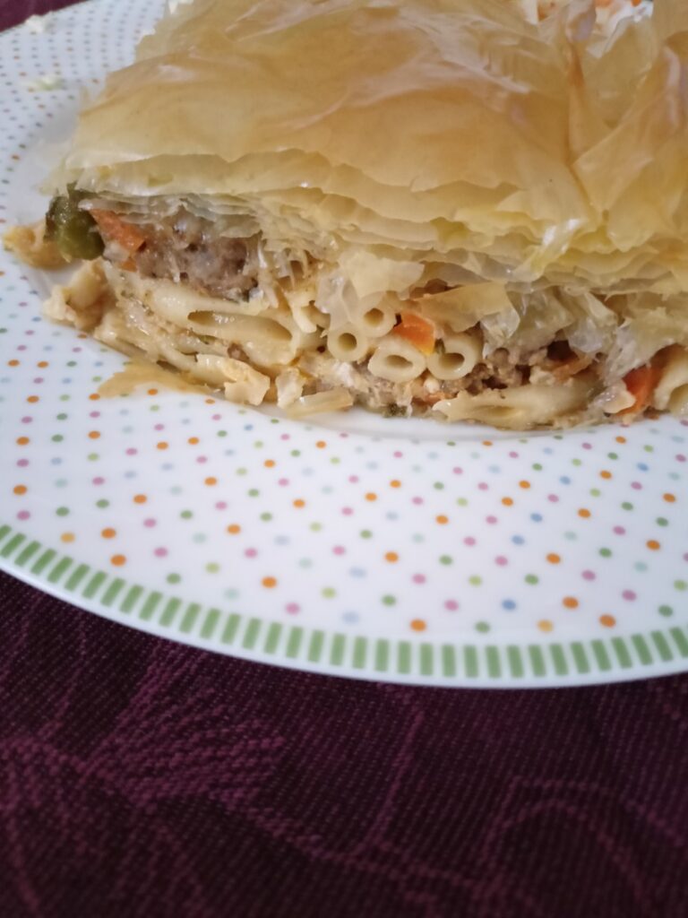 A piece of Makaronopita with phyllo image