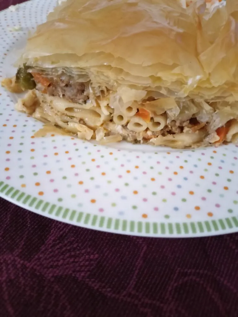 A piece of Makaronopita with phyllo image