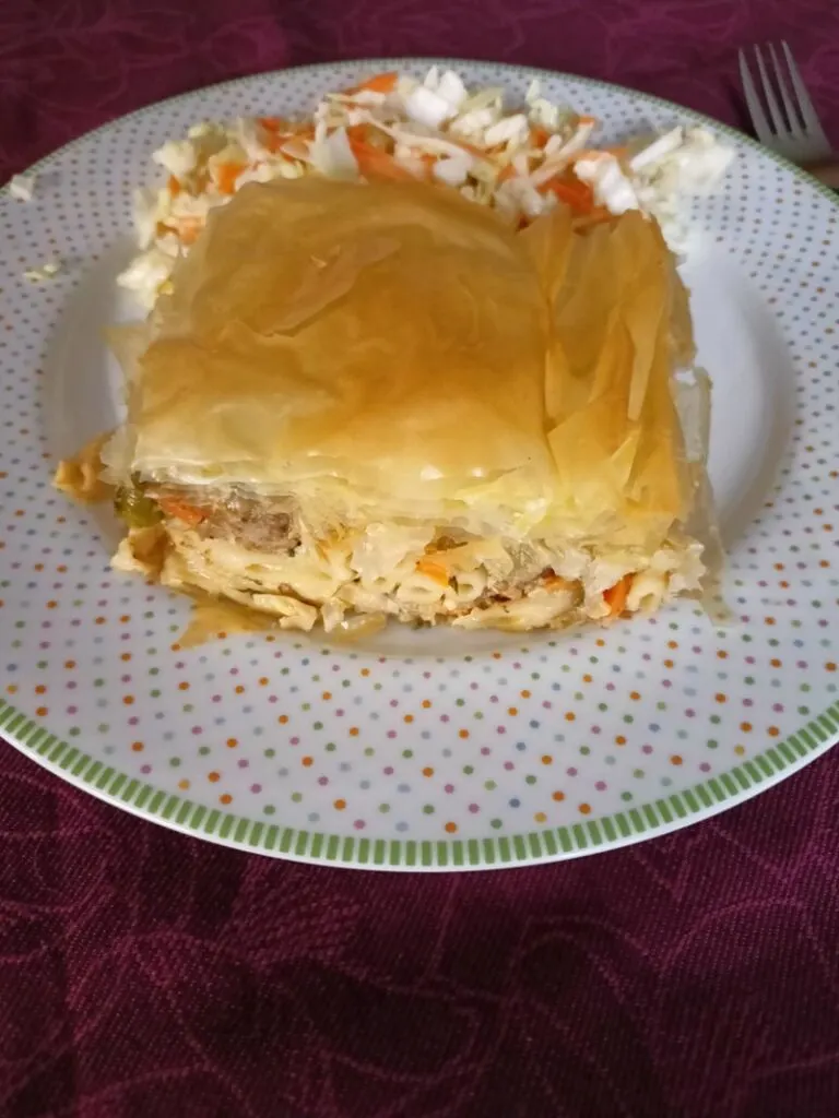 Makaronopita with cabbage and carrot salad image